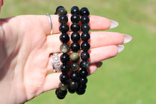 Load image into Gallery viewer, Gold Sheen obsidian bracelet
